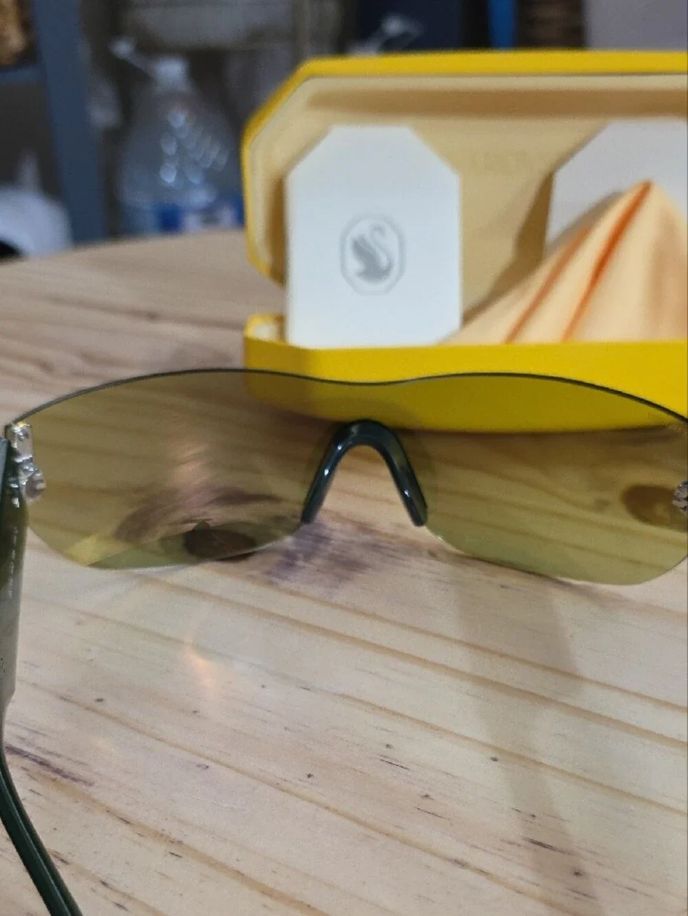 Swarovski Shield Sunglasses in Yellow-Green Tint